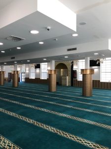 Interior image of Greenwich Islamic Centre showing the prayer room